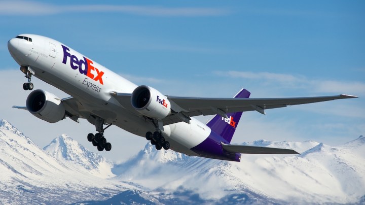 'Gina', or FedEx Boeing 777-FS2 (N858FD, cn 37729/936) was purchased brand new in 2011, showing the huge value of today's box hauling business. Here she departs from Runway 32 at Anchorage on April 26, 2013. Photo by BriYYZ via Flickr, CC BY-SA 2.0