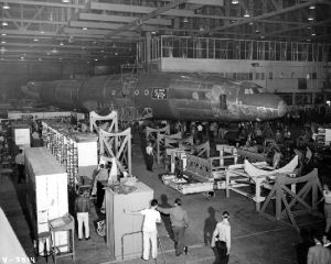 A C-69 fuselage (possibly the prototype) during construction. Despite their agrarian looks, the wooden cradles would offer precision support. (SDASM #00013536)