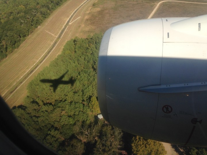 The shadow of return: on final approach to Houston George Bush Intercontinental. (Courtesy of Mark Vanhoenacker)