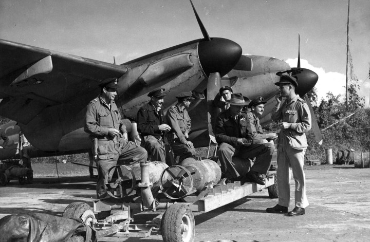 A RAAF crew load up their Mosquito FB (most likely a locally built Mk.40) in Burma. Note the under-wing hard points of the Fighter Bomber variants. (State Library of Victoria H98.100/1583)