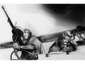 A carefully staged crew photo, showing the position of the air gunner, navigator and pilot. Guns weren't carried across the States, and most of the crew positions were filled by a (usually hungover) maintenance rating. 