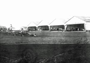 Nieuport 23Ms in front of the canvas hangars at Field 3 of the 3rd AIC, Issoudun. With 11 operation air fields and four more under construction, the Issoudun complex was the largest airbase in the world by war's end. (Wikipedia)