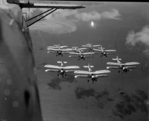 Formation flying has long been one of the RAF's great strengths (Black Arrows, Red Arrows). Here, Swordfish Mk.1s fly over the Solent, out of RAF Gosport, likely in summer 1939. (IWM MH 60)