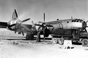 A 55th WRS WB-29 receives a radiation wash down at McClellan AFB, CA, on April 30th, 1952. Note the warning sign. This was SOP for Eielson ground crew when a ship came back 'hot'. (USAF)