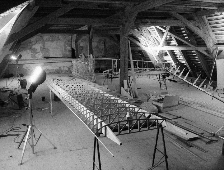 Work progresses on the replica glider's wings, in the lower attic of Colditz Castle. The PoWs had far less space – if a lot more time. (© Tony Hoskins)