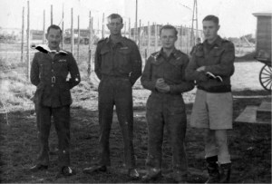 PoWs Bill Goldfinch (right) and Jack Best (second from left), the men behind the original Colditz Cock, at Stalag Luft III, Sagan, in 1942. (Courtesy of Pam Smith)