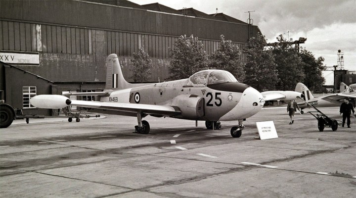 A lovely study of Jet Provost T3 XN469 '25' in the 1960s, with Chipmunk and Vampire tails behind. Delivered in October 1960, this aircraft crashed on East Moor Yorkshire in June 1970. (Photo by Neil Aird CC BY-NC-ND 2.0 via kitchener.lord | flickr.com) 