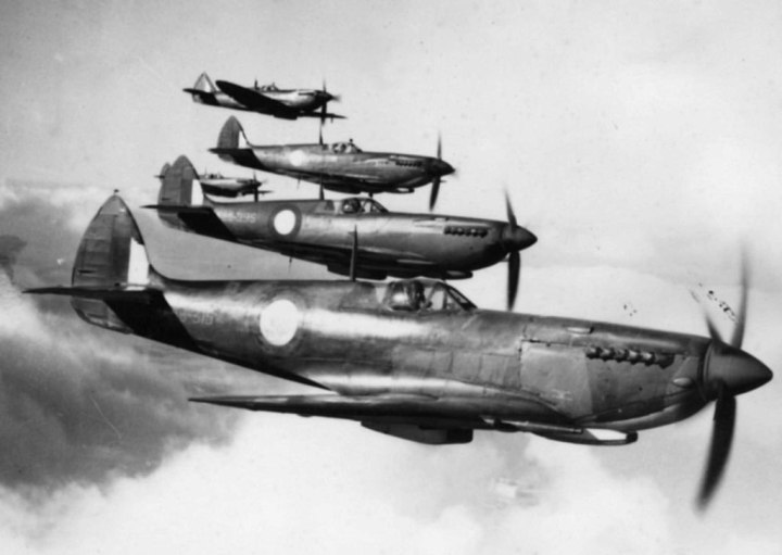 On the prowl... Spitfire LF Mk.VIIIs of the RAAF, on patrol – identified are A58-315 (JG377); and A58-395 (JF934). (State Library of Victoria)